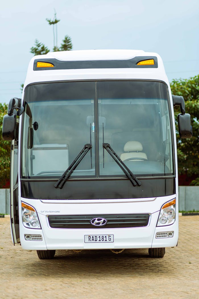 High-quality image of a Hyundai bus emphasizing front design and transportation theme.